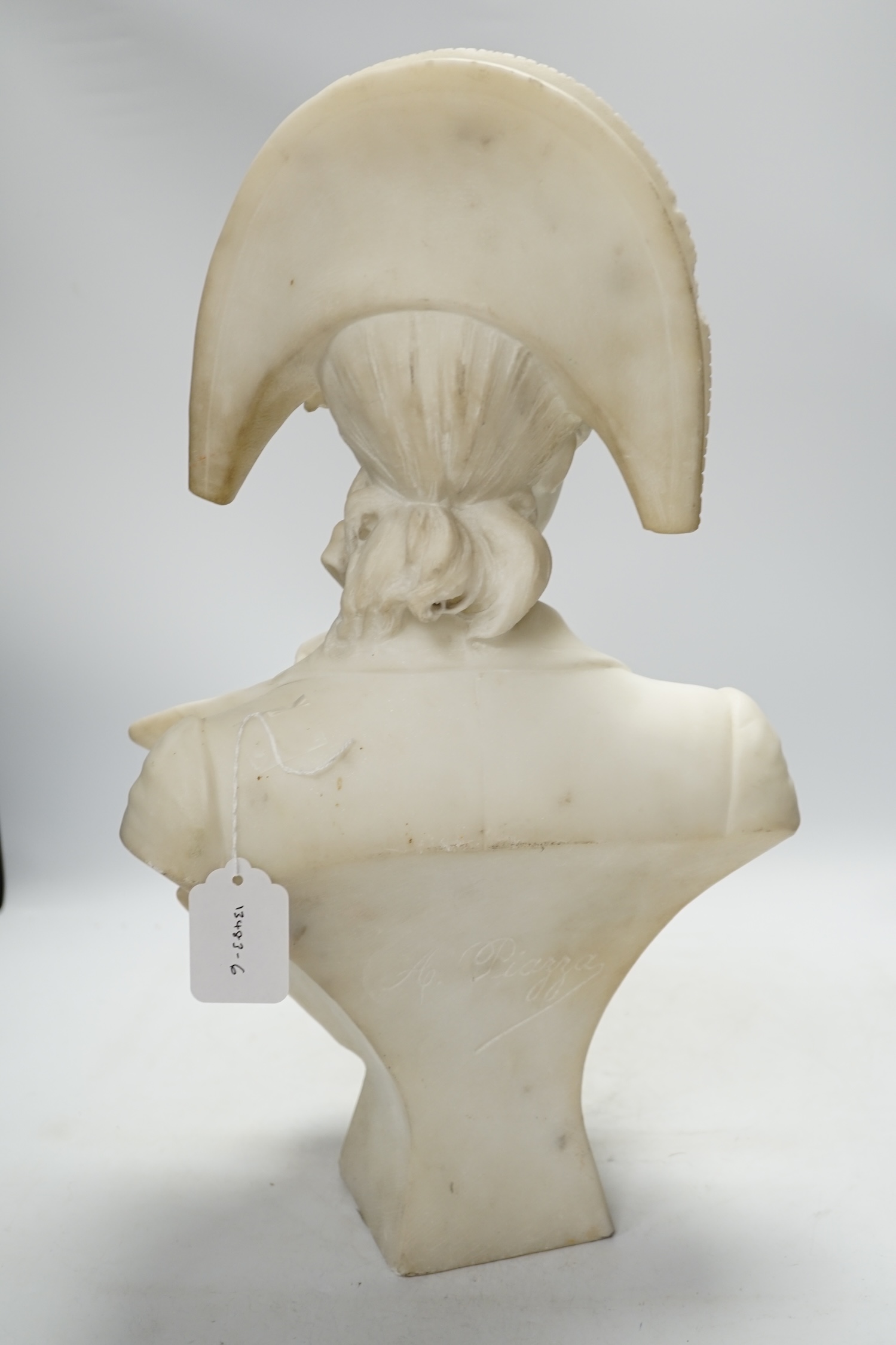 A. Piazza marble bust of a lady in a bi-corn hat, 50cm high